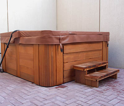outdoor hot tub covered up